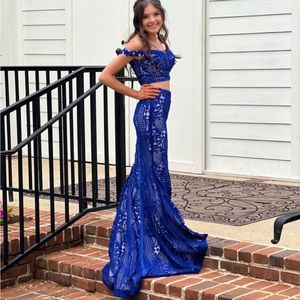 Two piece double 0 prom dress has been altered,